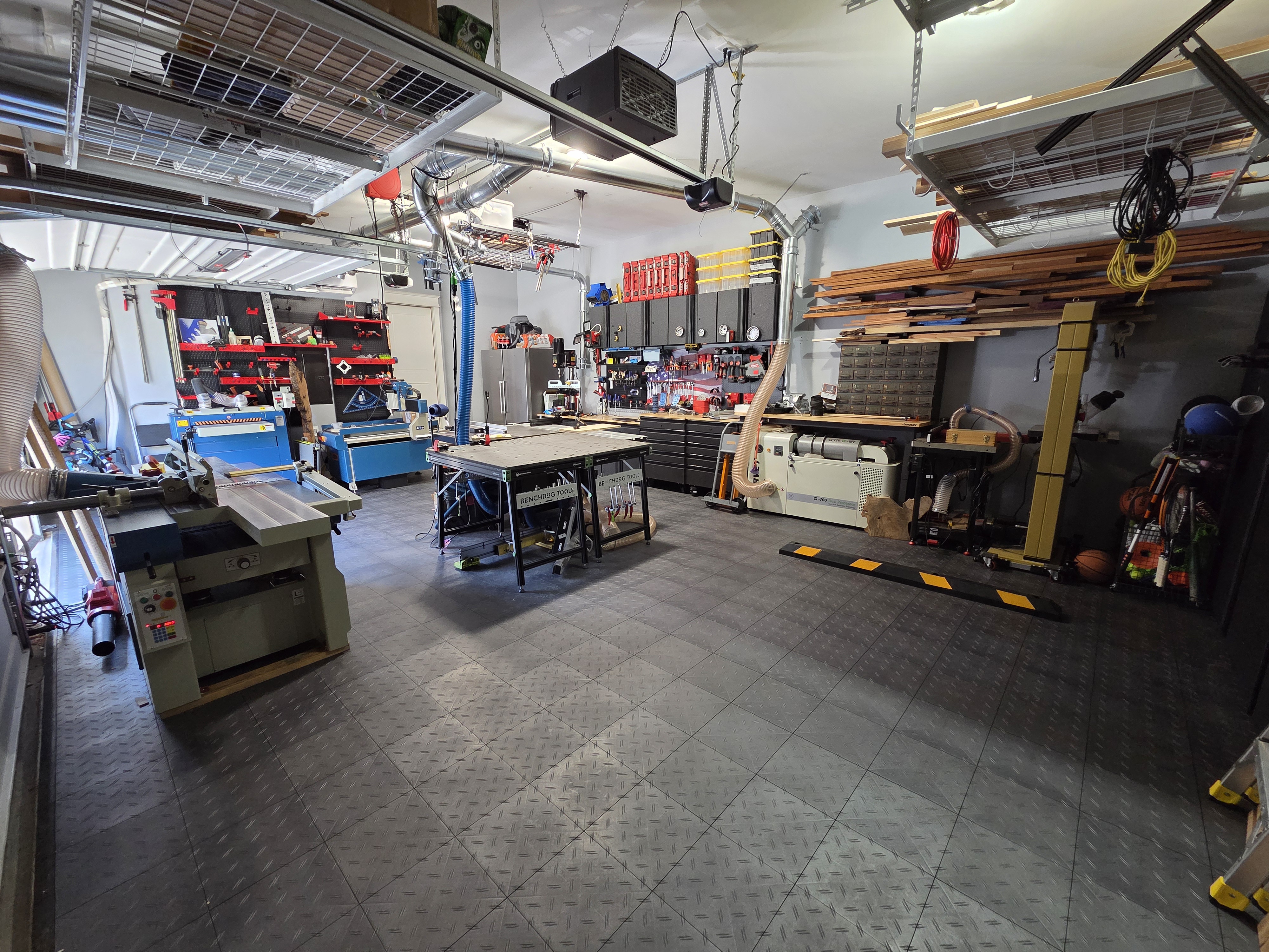 Downing Woodworks Assembly Center showing Baileigh CNC router, fixture bench and organized tool walls